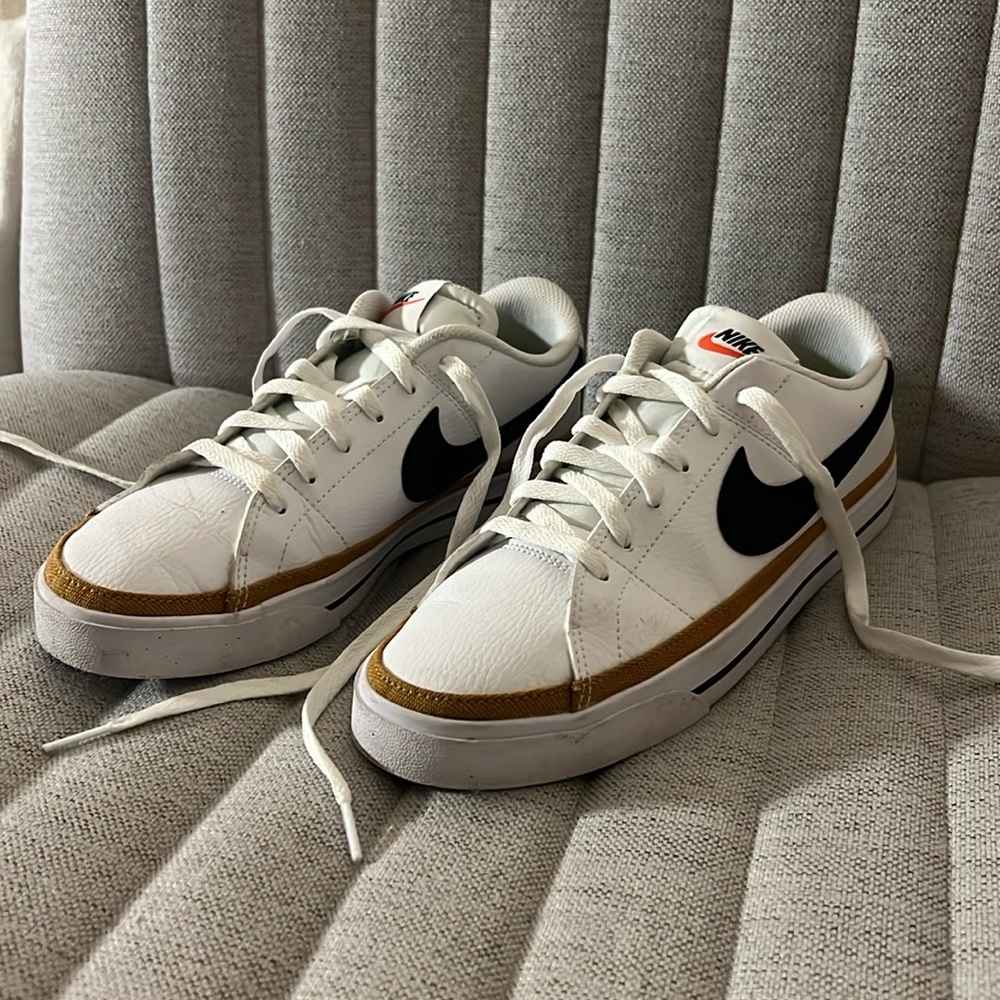 Nike Court Legacy Next Nature. White with black and brown accents.